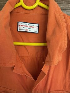 ORANGE BUTTON UP