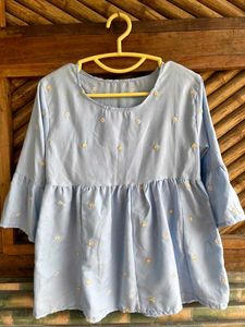 Light Blue Embroidered Peplum Top
