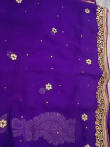A Purple Blue Saree With Heavy Work