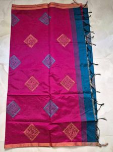 Elegant Teal Saree with Diamond Motifs