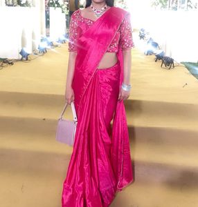 Vibrant Pink Silk Saree with Embroidered Blouse