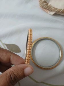 Elegant Gold Bangle with Black Stones