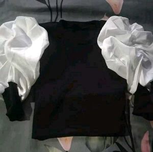 Chic Black Top with Dramatic Puffy Sleeves
