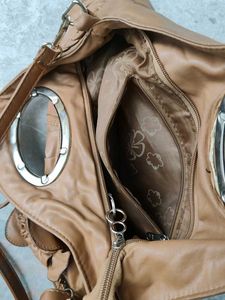 Chic Tan Leather Shoulder Bag with Flower Detail