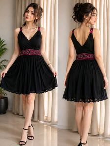 Black Mini Dress with Pink Embellishments