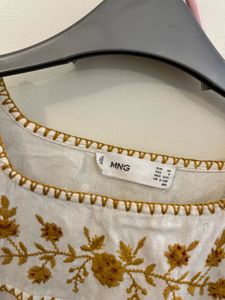 Embroidered Flutter Sleeve Top