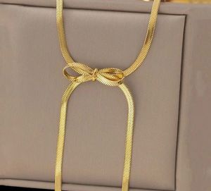 Elegant Gold Bow Necklace