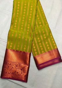Vibrant Green Silk Saree with Pink Border