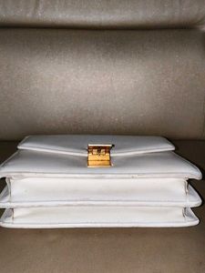 Classic White Structured Handbag with Gold Clasp
