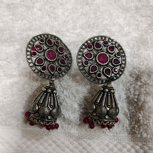 Silver look alike earing with Ruby stone