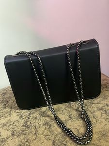 NEW BLACK SLING BAG ( Not used)