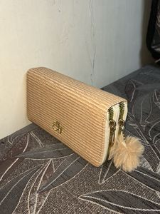 Chic Beige Textured Wallet with Pom Po