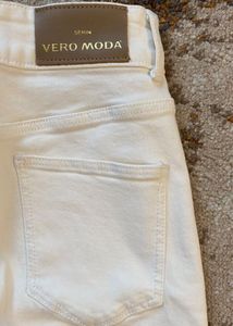 Cream High-Waisted Flare Jeans