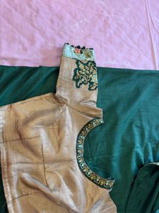 Elegant Green Saree with Floral Border