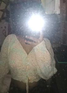 long-sleeve cropped blouse with a tie-front