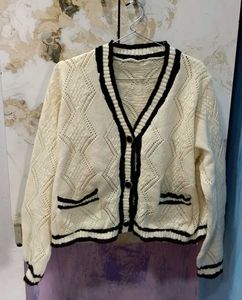 Stylish Knitted Cardigan with Black Trim