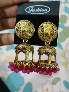 Elegant Gold Tone Jhumka Earrings with Pink Beads