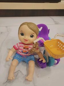 baby alive doll with bicycle