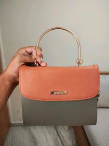 Chic Two-Tone Handbag with Gold Handle