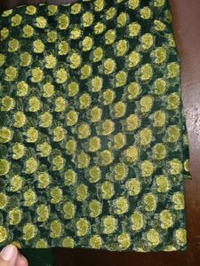 Elegant Green Saree with Gold Floral Motifs