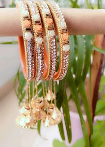 Beautiful Orange &amp; Gold Bangles with Charms
