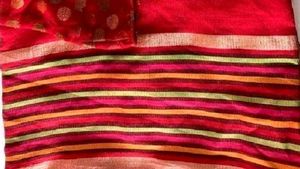Red Saree with Golden Border and Polka dots Blouse