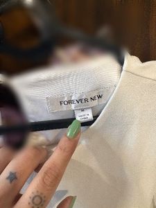Chic White Top with Sheer Sleeves