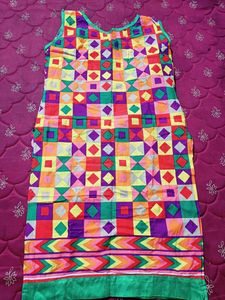 Multi Coloured Cotton Kurti With Pearls Attached On The Neck And Bottom Part.