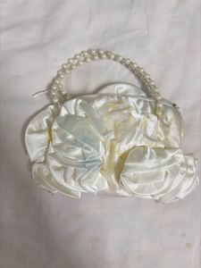 Elegant White Satin Pearl Handle Clutch