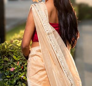 Elegant Cream Saree with Golden Border
