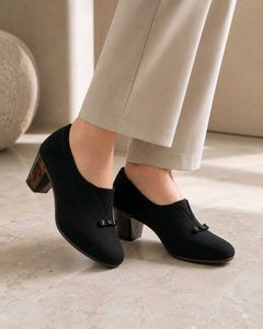 Chic Black Heels with Bow Accent