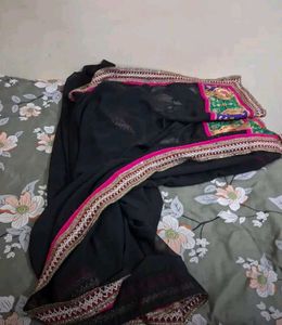 Elegant Black Saree with Vibrant Border unused