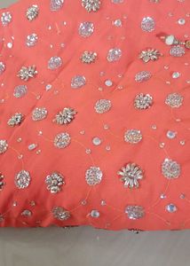 Stunning Orange Embellished Saree