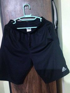 Authentic Adidas performance mesh shorts.