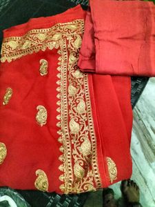 Elegant Red Saree with Gold Embroidery