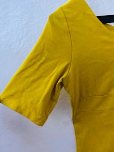 yellow crop top