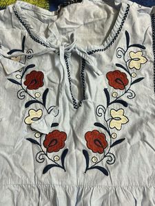 Embroidered Light Blue Peplum Top