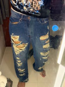 Distressed Blue Denim Jeans