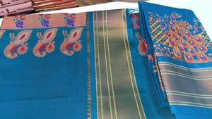 Beautiful Teal Peacock Embroidered Saree