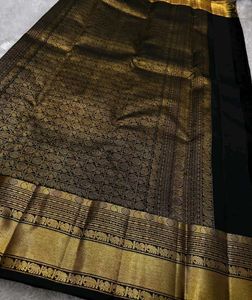 Elegant Black Saree with Gold Elephant Motif