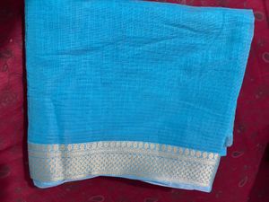 Elegant light Blue Saree with Golden Border