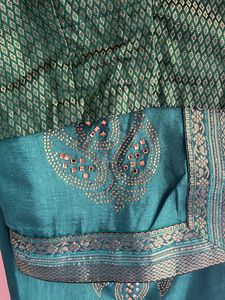 Elegant Teal Saree with Embellished Blouse