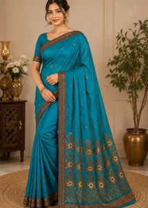 Elegant Teal Saree with Embellished Border
