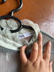 Sheer Sleeve Ruffle Top