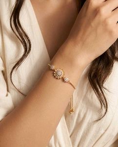 Elegant Gold Plated Bracelet with Floral Design