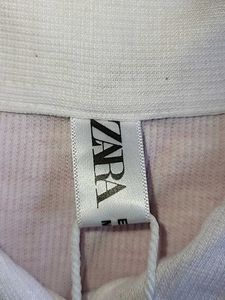 Sleeveless White Polo Top
