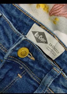 Distressed Blue Denim Jeans
