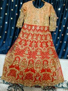 bridal gown peach and red colour