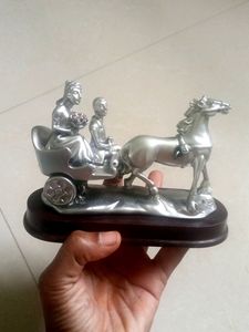 Cute Couple on chariot Statue
