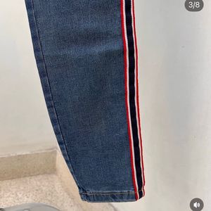 Stylish Blue Jeans with Red Side Stripe